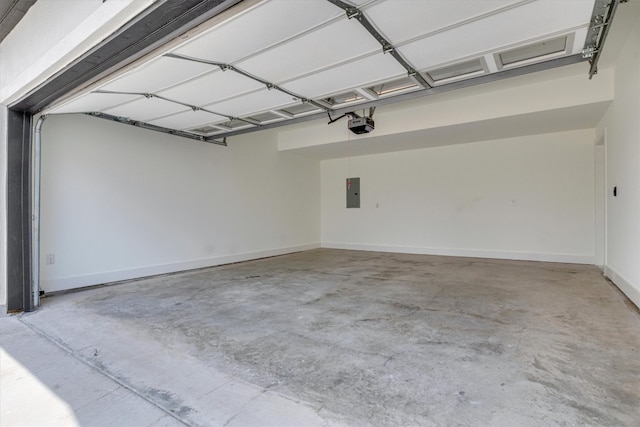 garage featuring a garage door opener and electric panel