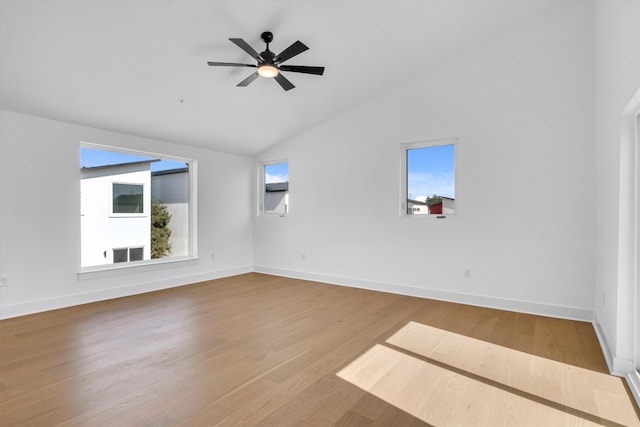 unfurnished living room with lofted ceiling, hardwood / wood-style floors, and ceiling fan