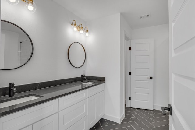 bathroom featuring vanity and tile patterned floors