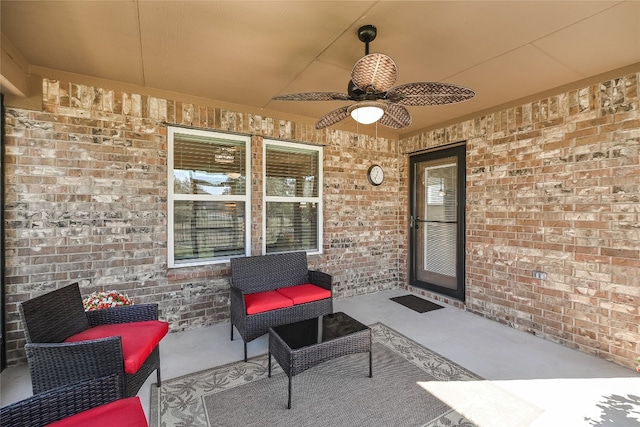 view of patio featuring ceiling fan