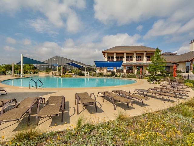 view of pool with a patio