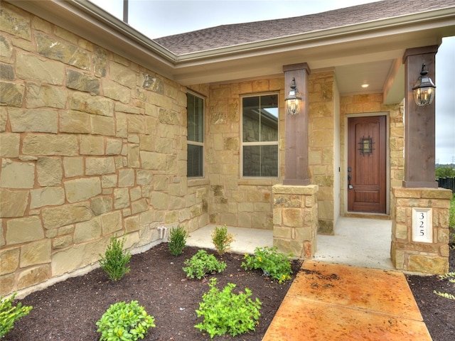 entrance to property with covered porch