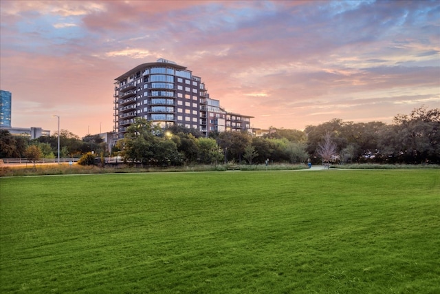 surrounding community featuring a lawn