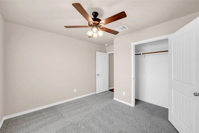 unfurnished bedroom featuring a closet, ceiling fan, and carpet