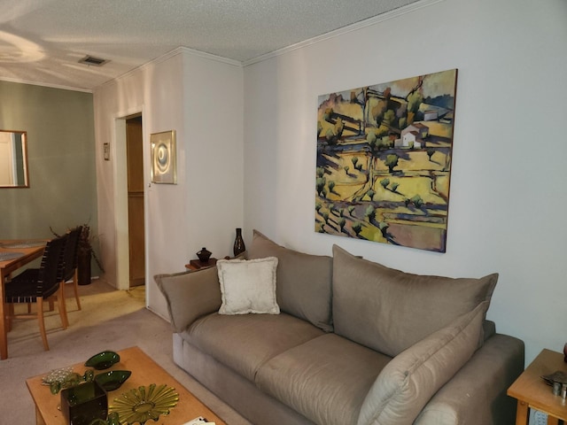 living room featuring crown molding, a textured ceiling, and carpet