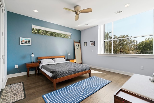 bedroom with recessed lighting, wood finished floors, visible vents, baseboards, and ceiling fan