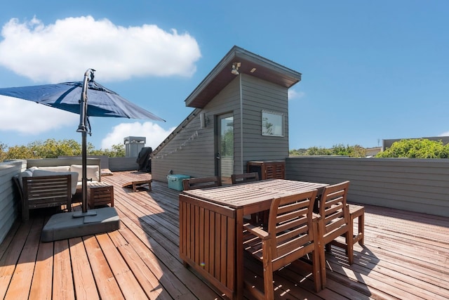 deck featuring an outdoor living space