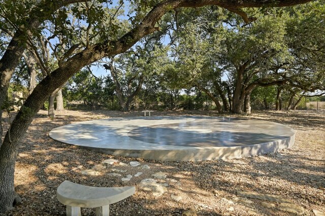 view of pool with basketball court