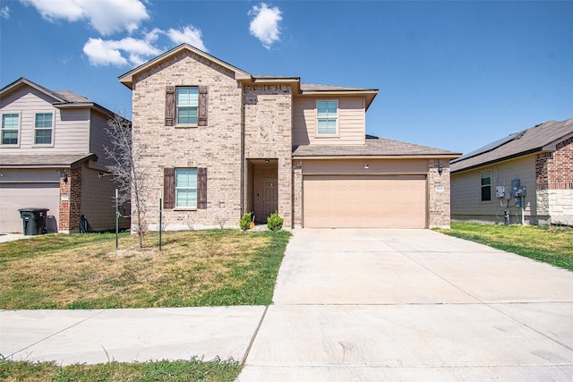 view of front of property with a garage and a front lawn