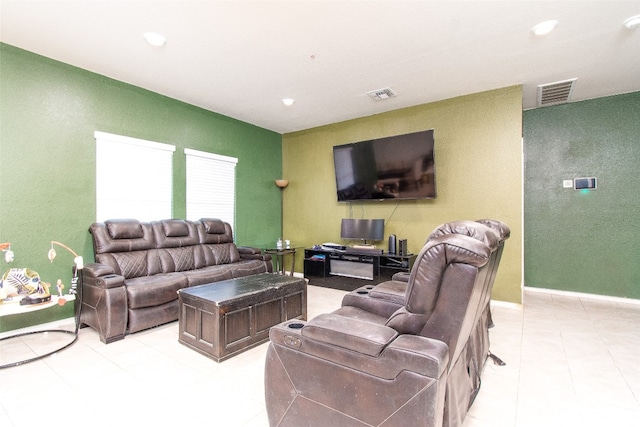 living room with light tile patterned floors