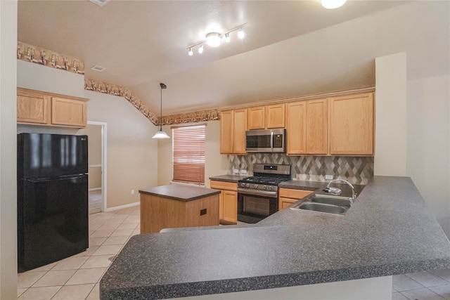 kitchen featuring a center island, stainless steel appliances, sink, and light brown cabinets