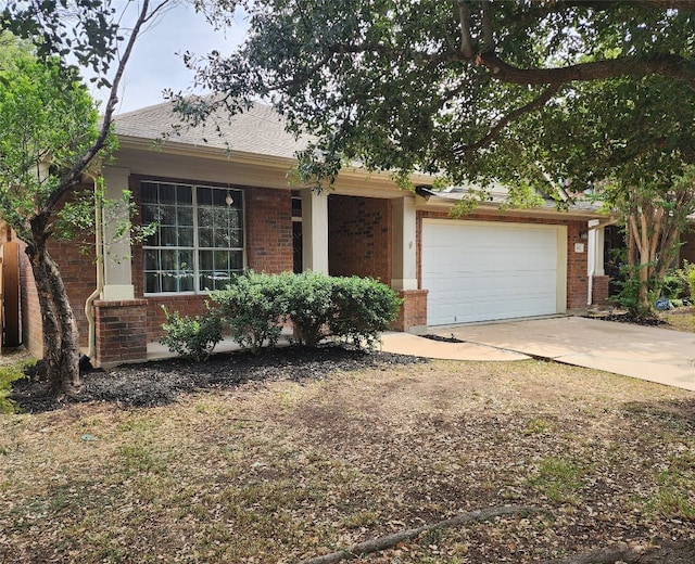 ranch-style house featuring a garage