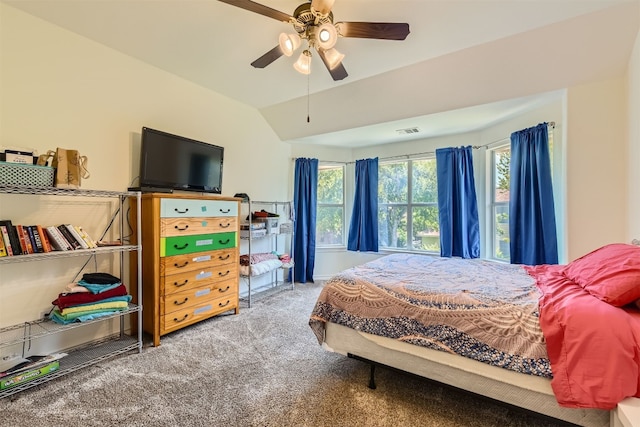 bedroom featuring carpet flooring, ceiling fan, and vaulted ceiling