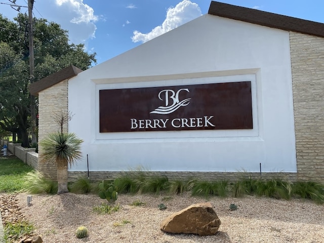 view of community sign