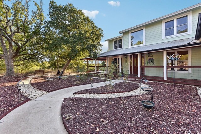 view of front of home featuring covered porch