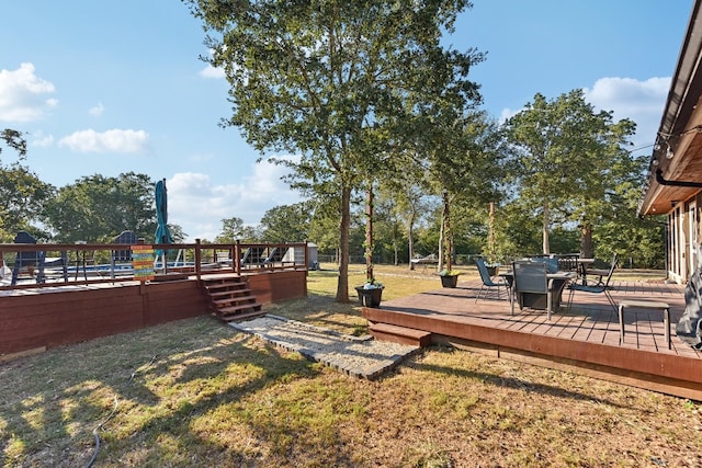 view of yard with a deck