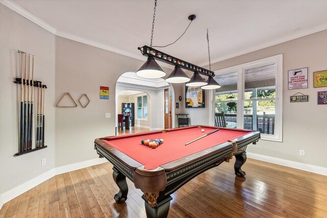 recreation room featuring hardwood / wood-style floors, pool table, and crown molding