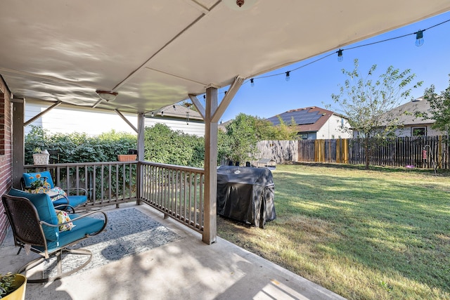 view of patio with a grill