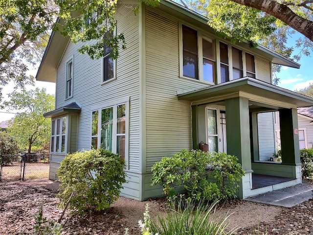 314 Pershing Ave, San Antonio, TX 78209 - view of side of home featuring fence and a gate