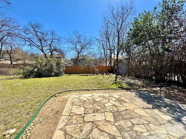 314 Pershing Ave, San Antonio, TX 78209 - view of yard featuring a fenced backyard and a patio area