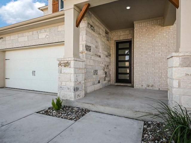 entrance to property featuring a garage