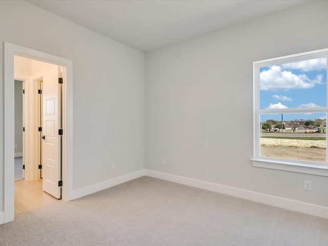 view of carpeted spare room