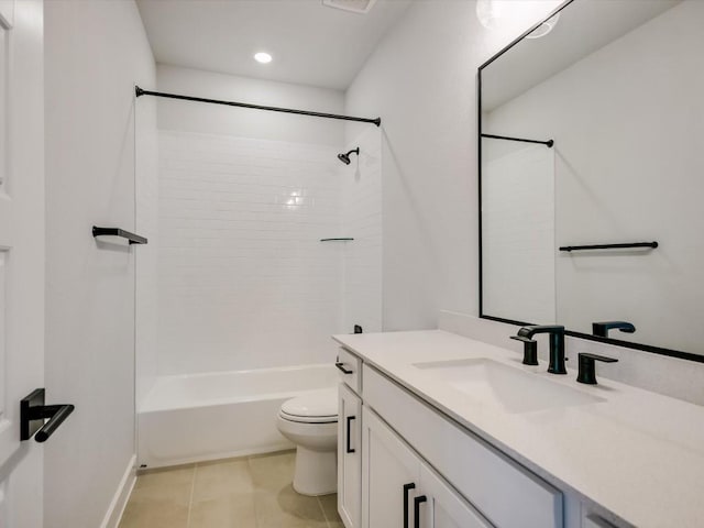 full bathroom with tile patterned flooring, vanity, toilet, and tiled shower / bath