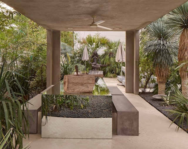 view of patio with ceiling fan