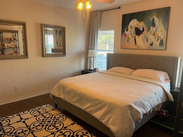 bedroom featuring ceiling fan and hardwood / wood-style flooring