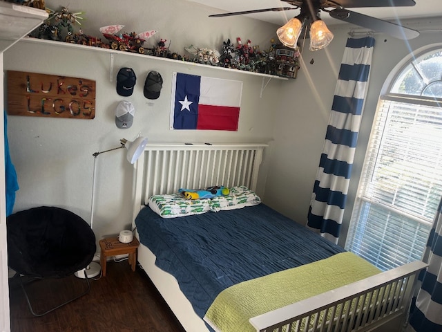 bedroom featuring dark hardwood / wood-style floors