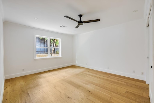 2900 Windsor Rd, Austin, TX 78703 - unfurnished room with a ceiling fan, light wood-style floors, and baseboards