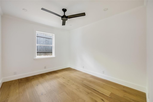 2900 Windsor Rd, Austin, TX 78703 - spare room featuring ceiling fan, baseboards, light wood-style floors, and ornamental molding