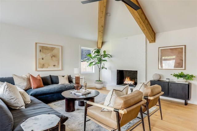 2900 Windsor Rd, Austin, TX 78703 - living room with light wood-type flooring, a fireplace, beam ceiling, and baseboards