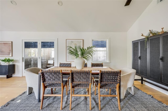 2900 Windsor Rd, Austin, TX 78703 - dining space with light wood finished floors and vaulted ceiling
