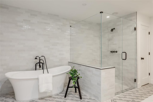 2900 Windsor Rd, Austin, TX 78703 - full bath with tile walls, a stall shower, and a freestanding bath