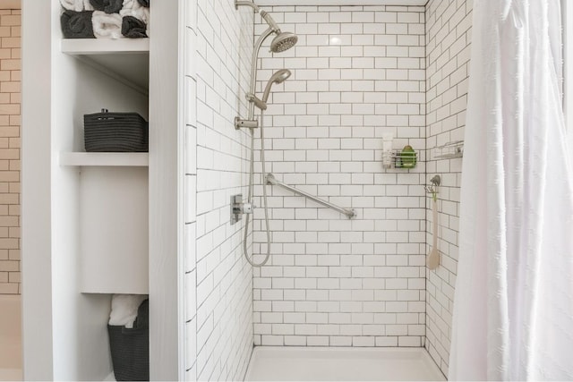 bathroom featuring curtained shower