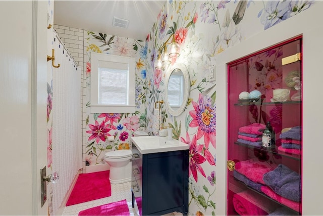 bathroom with vanity, toilet, and a shower with curtain