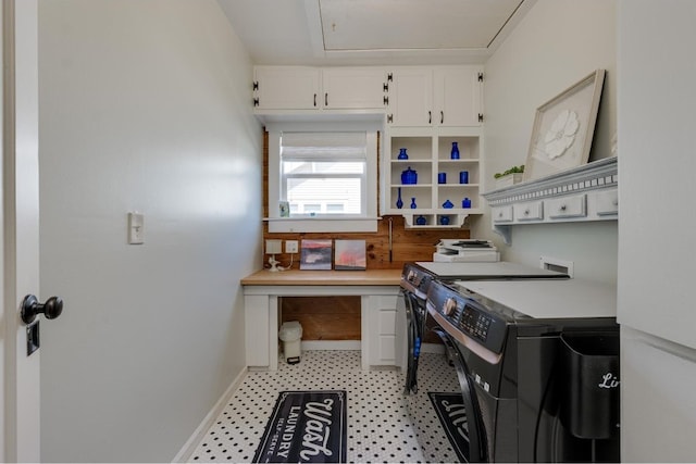 washroom featuring washing machine and dryer