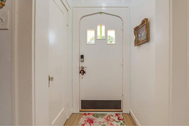 doorway to outside featuring light hardwood / wood-style flooring