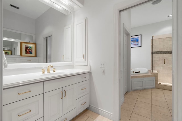 full bath with a garden tub, visible vents, vanity, tile patterned flooring, and tiled shower