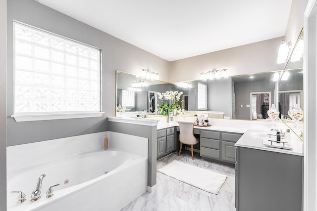 bathroom featuring vanity and a bathtub