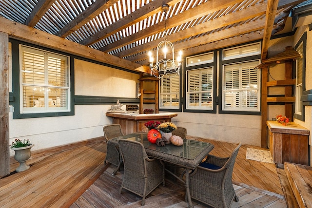 deck featuring a fireplace and a pergola