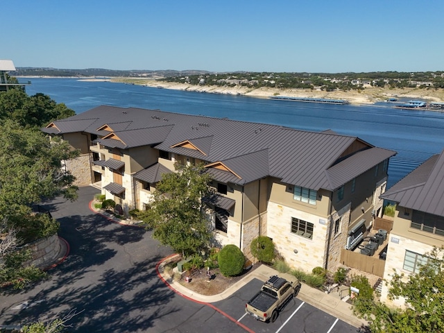 drone / aerial view with a water view