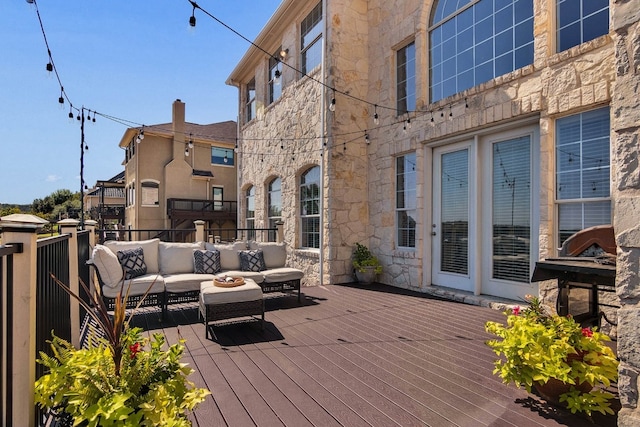 deck with an outdoor hangout area