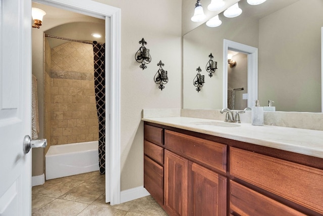 bathroom with vanity, tile patterned floors, and shower / bath combo