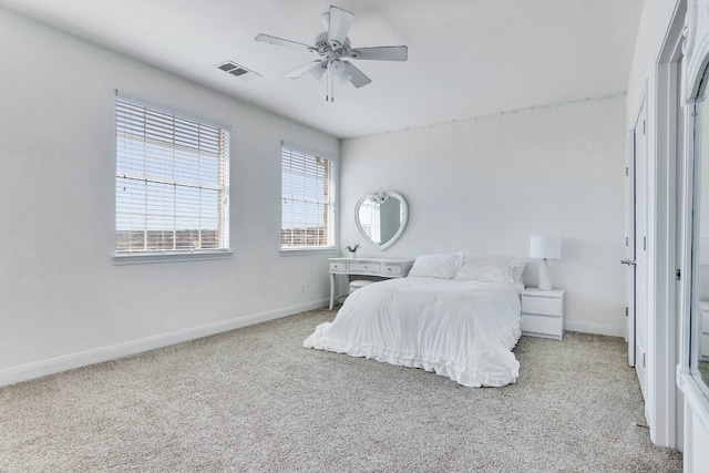 carpeted bedroom featuring ceiling fan