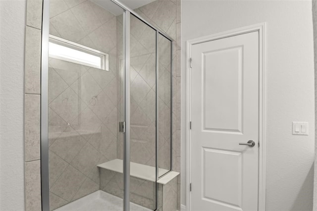 bathroom with an enclosed shower