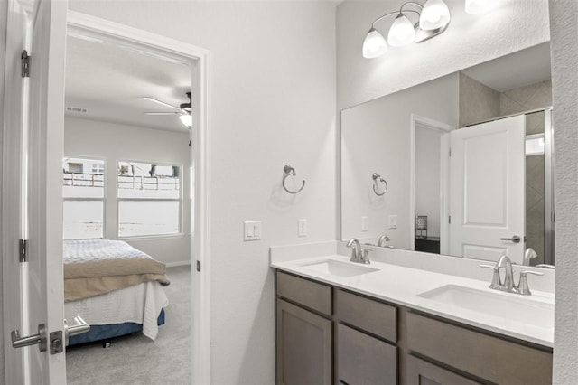 bathroom featuring vanity and ceiling fan