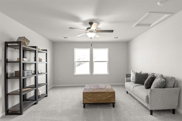 living room with light carpet and ceiling fan