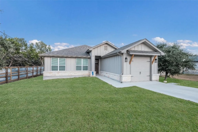 ranch-style house with fence, a front lawn, a garage, board and batten siding, and concrete driveway